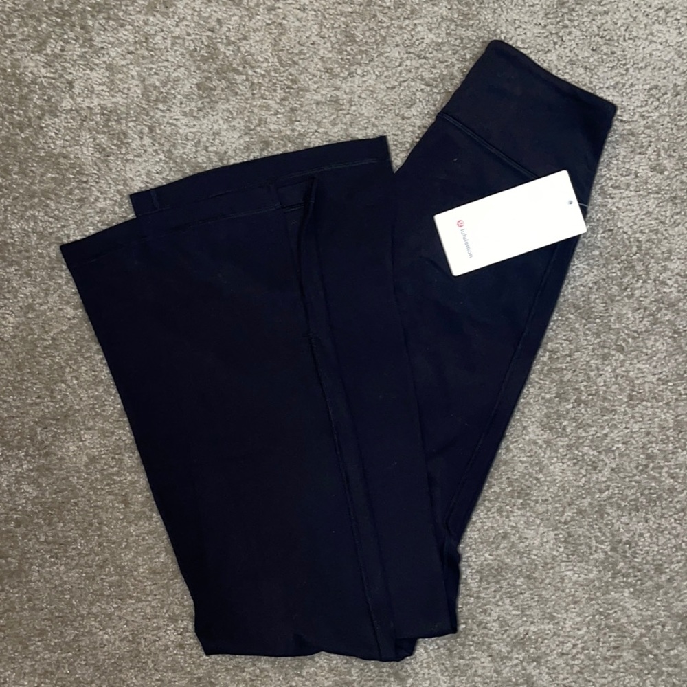 Lululemon never worn, Slit-Hem Flare *Nulu Leggings. Black, size 4